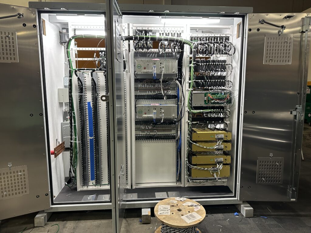 A wayside train control cabinet being assembled and wired in the B&C Transit facility.